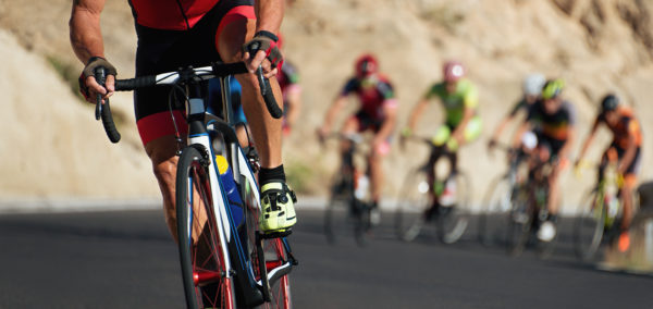 Cycling,Competition,cyclist,Athletes,Riding,A,Race,climbing,Up,A,Hill,On